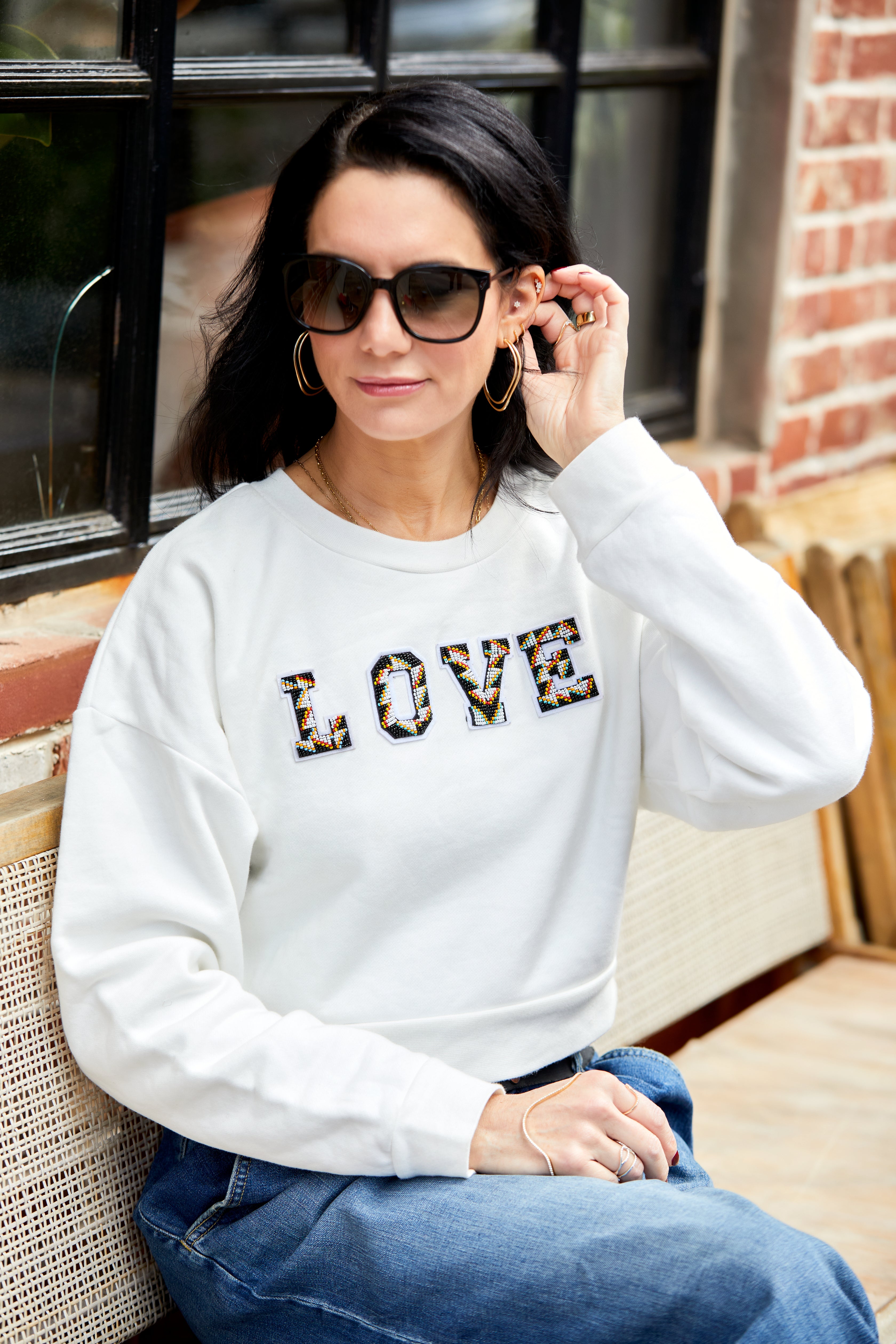 One-of-a-kind Reformation x Love is Project Sweatshirt