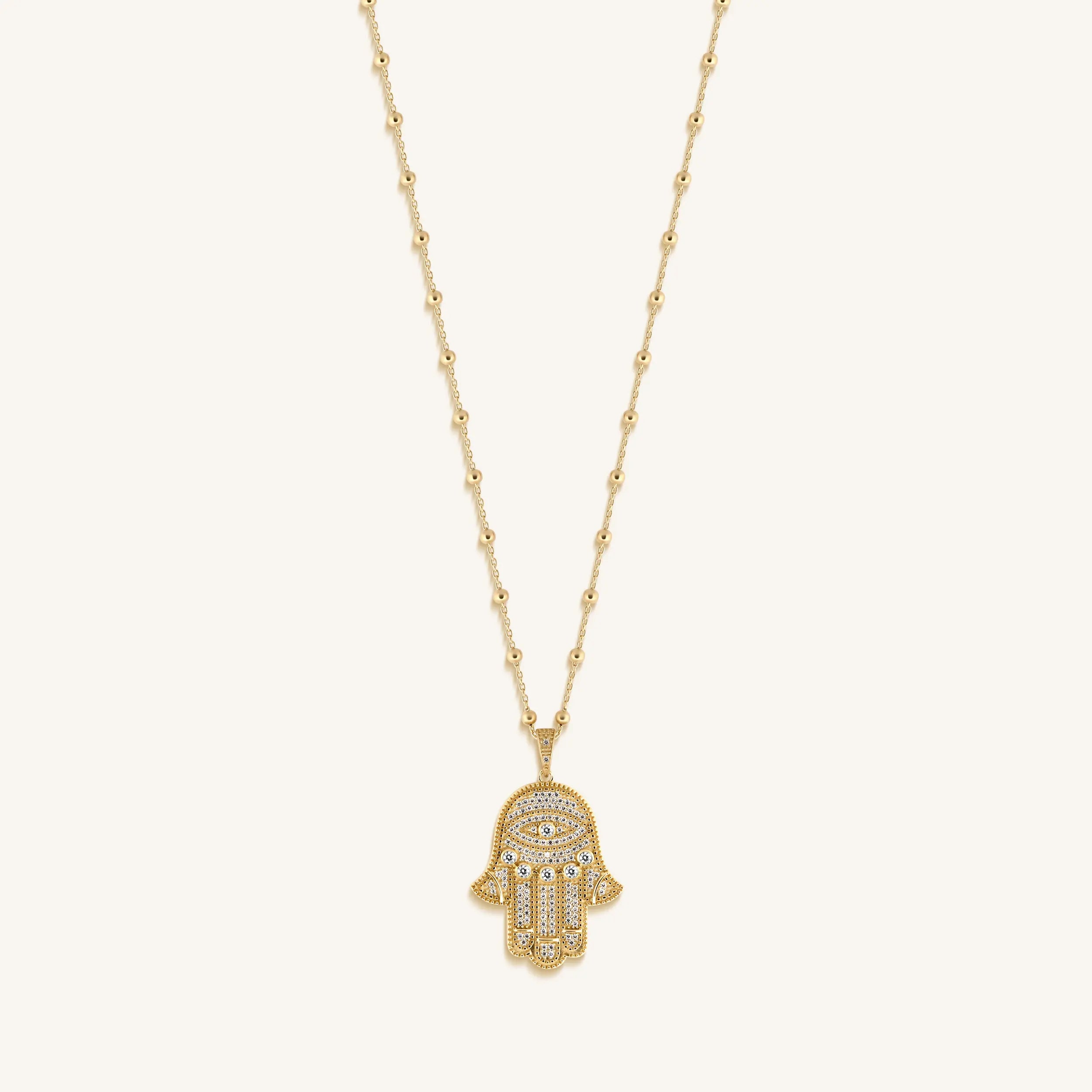 Inspired Action Gold Evil Eye & Hamsa Hand Necklace